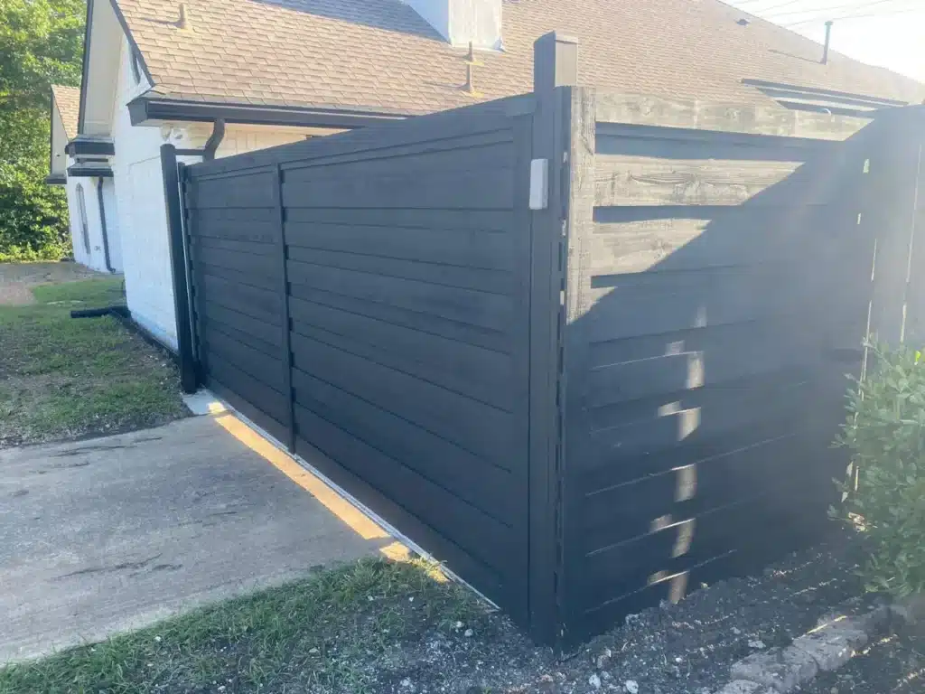 black wooden gate and fence