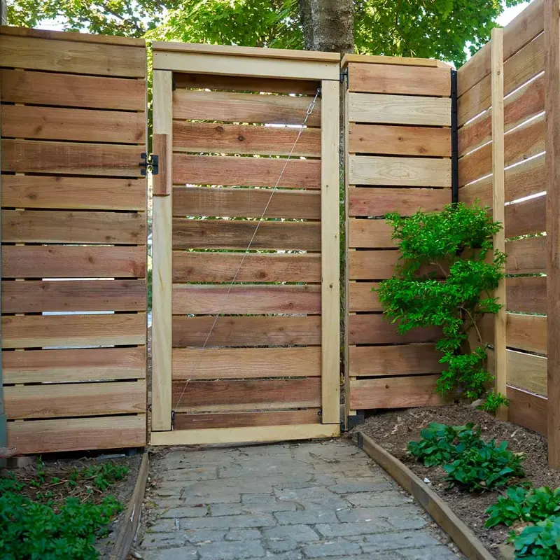 fully repaired wooden fence door