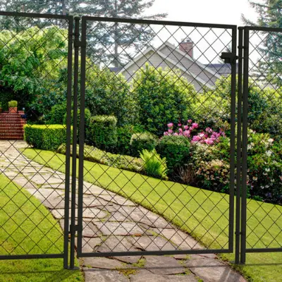 transparent mesh fence gate with garden behind it