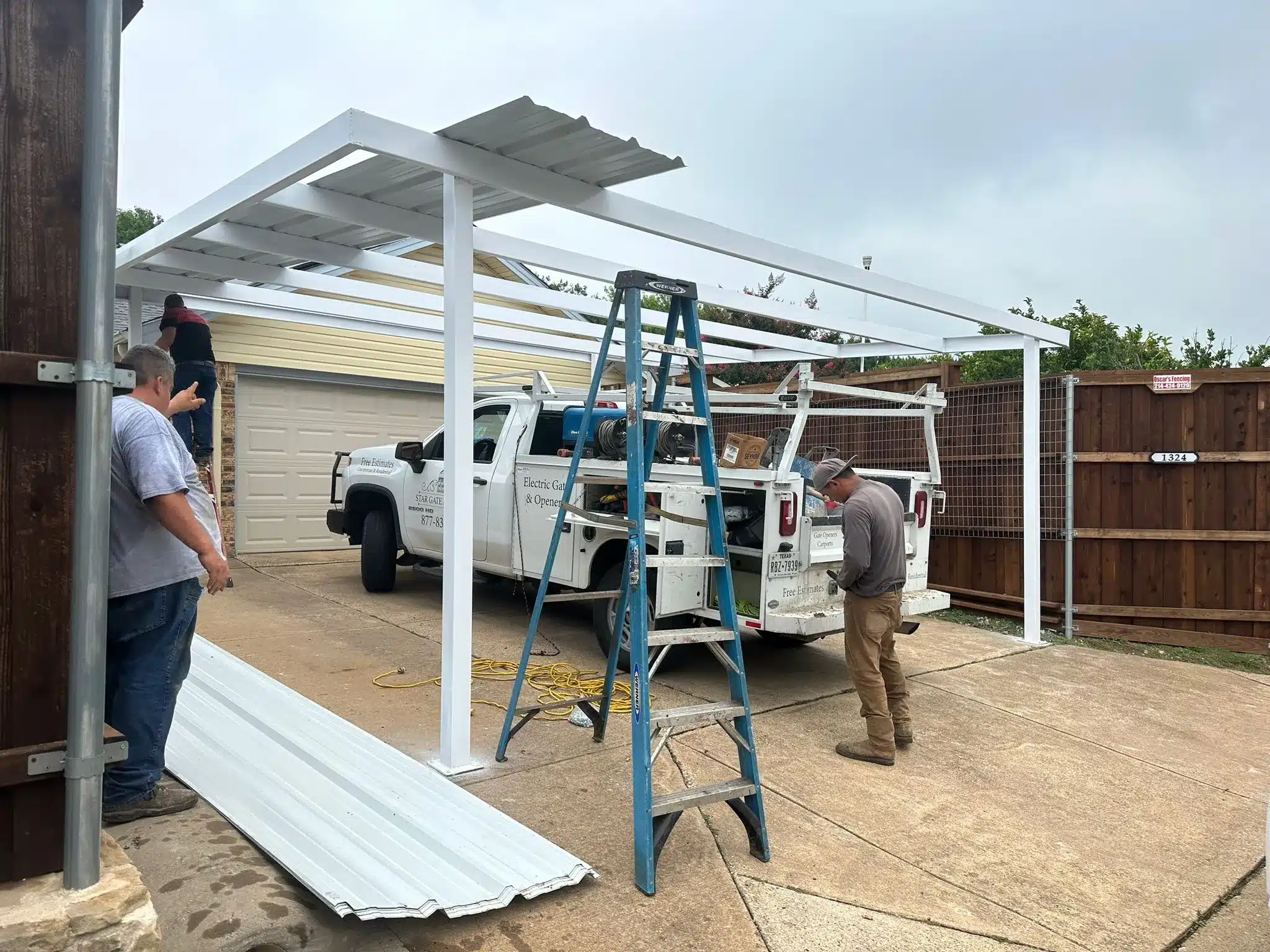Carport construction over a concrete pad