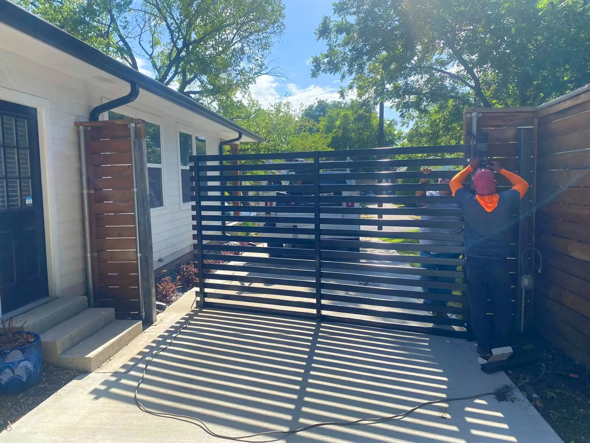 Star Gate & Fence assessing a fence line in DFW