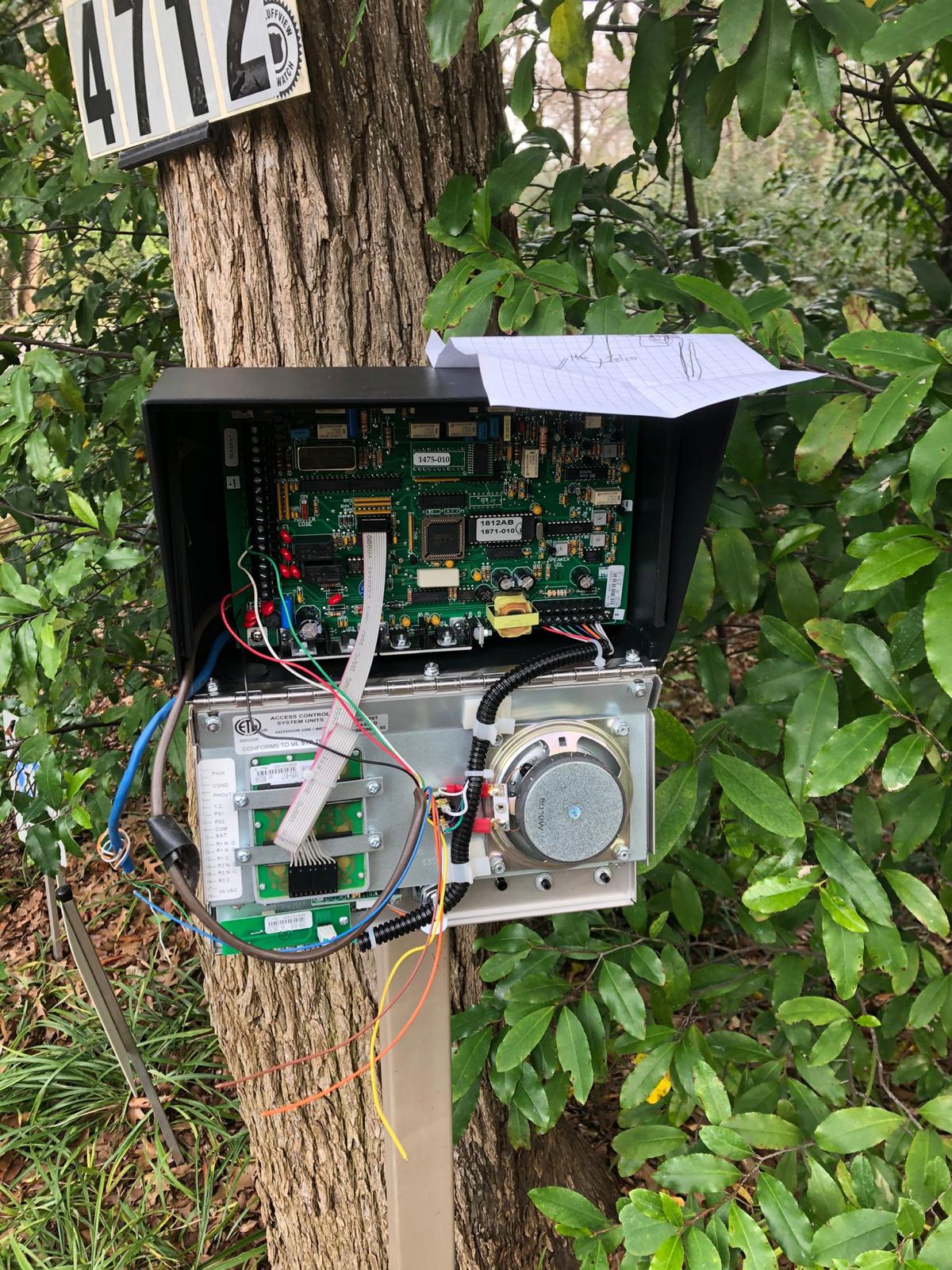 Access control hardware wired at a gated entry