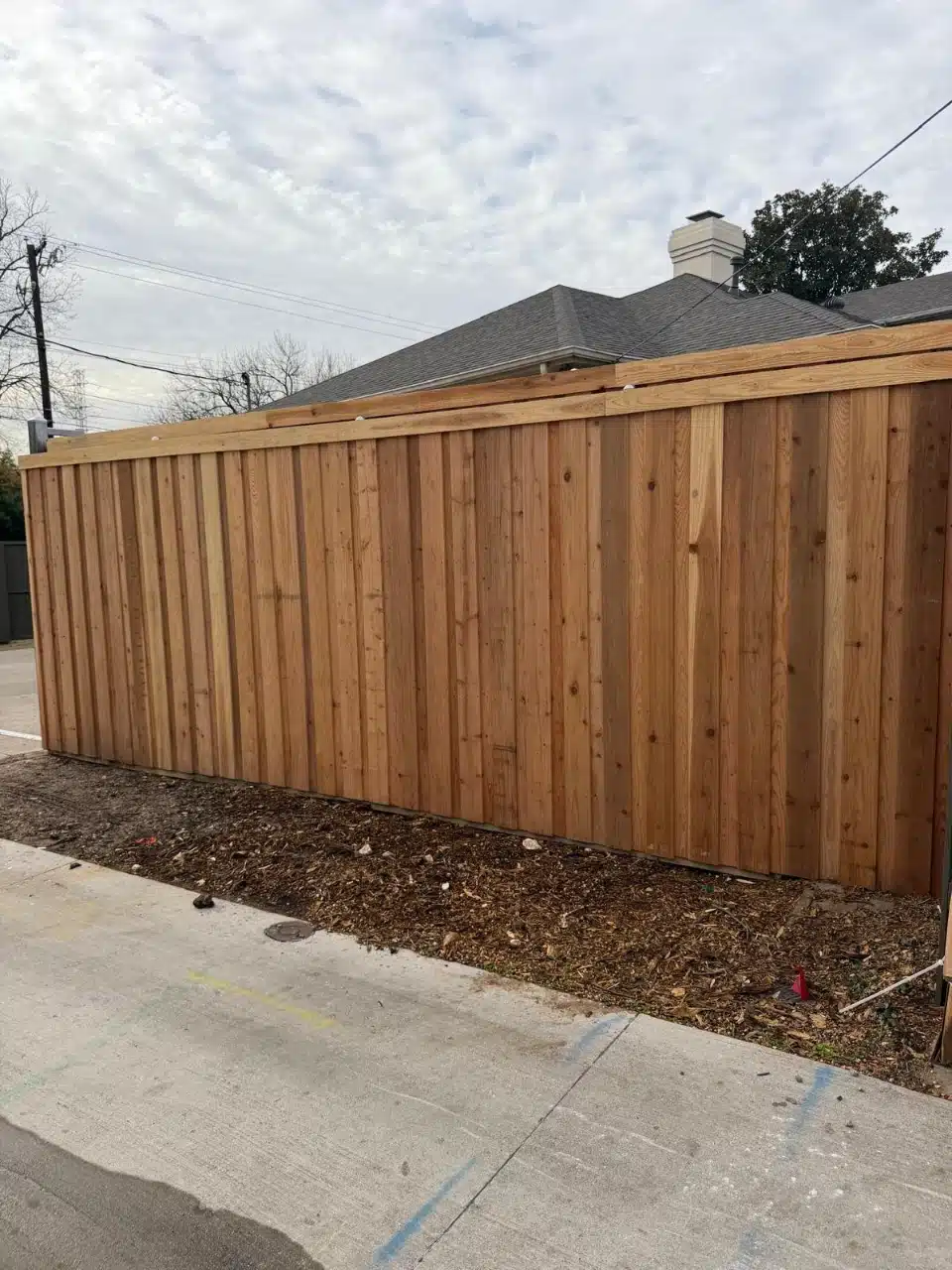 New cedar privacy fence installed in Highland Park, Texas