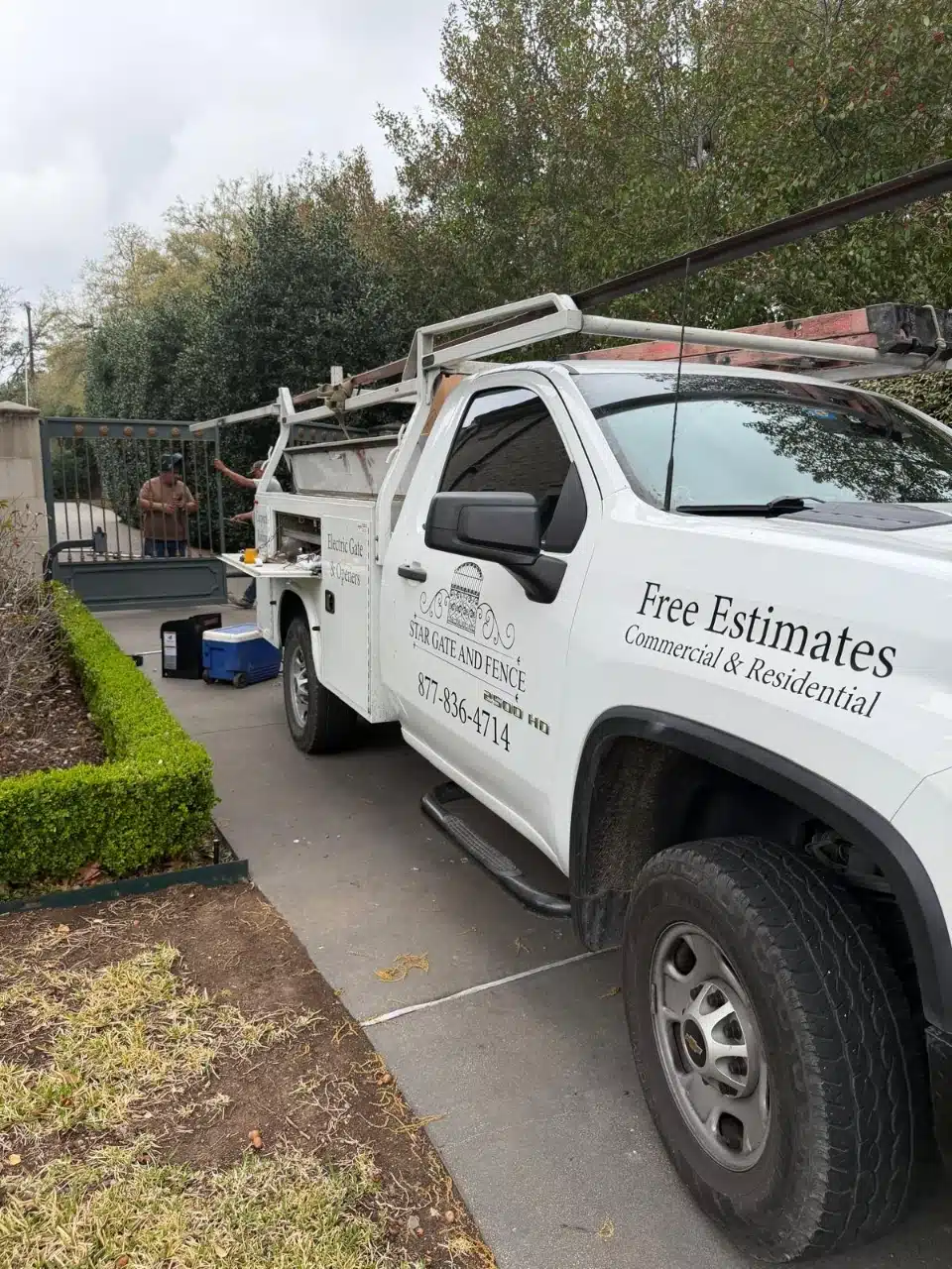 Star Gate and Fence service truck parked at the job site