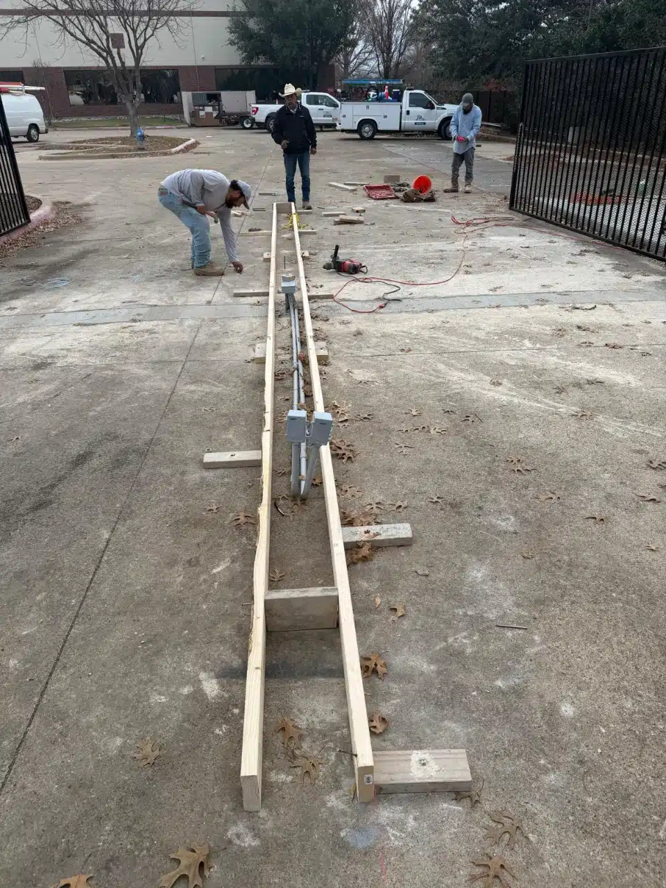 Screed rails and forms set along the line of a new concrete pour