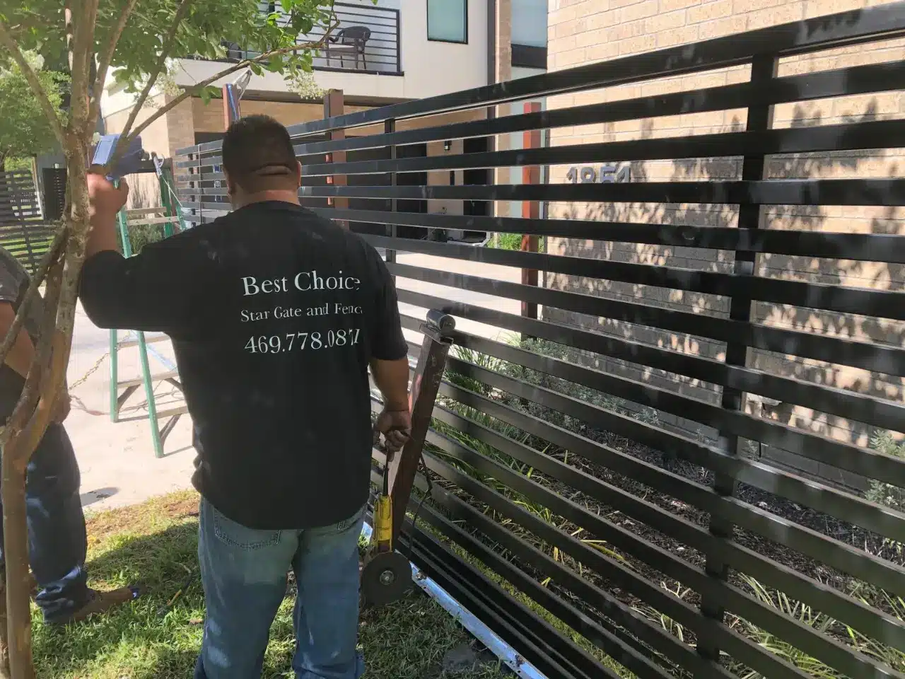 Aluminum gate installation at a modern DFW home