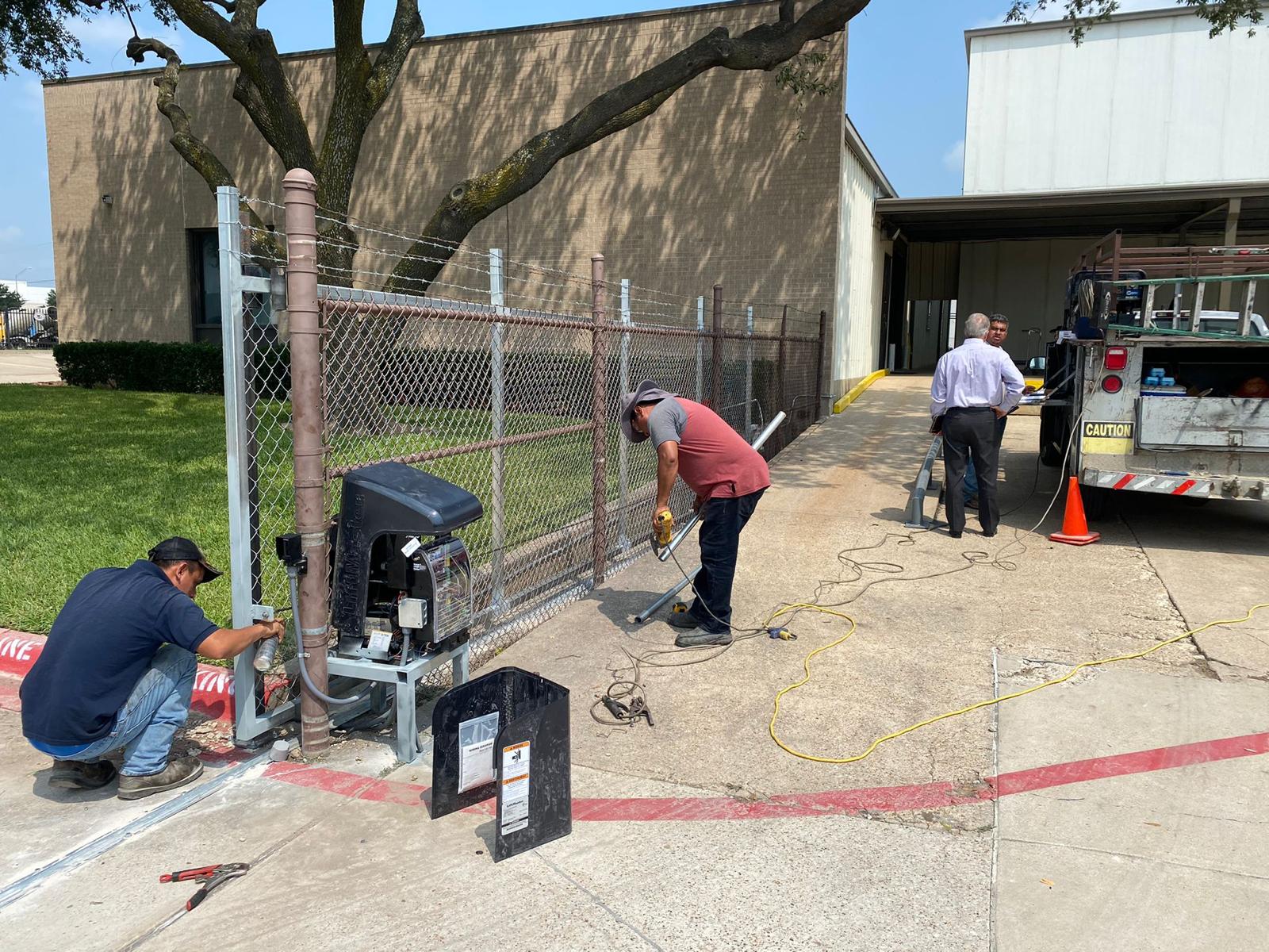 Star Gate & Fence crew on a fence repair job in Frisco