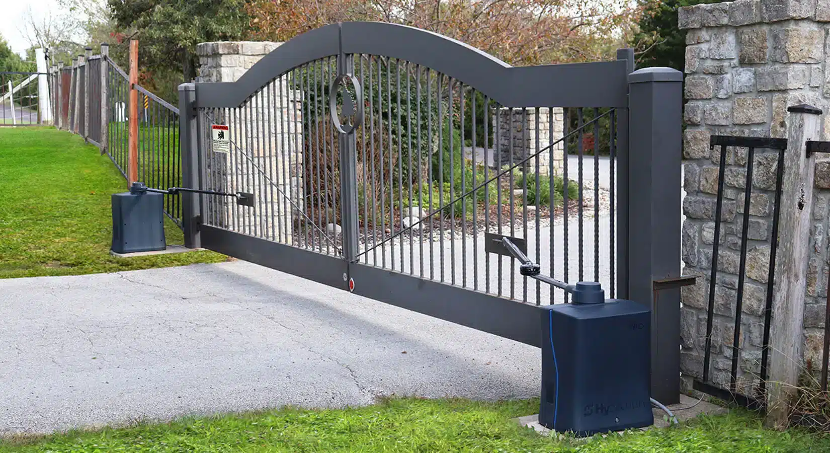 Automatic gate operator installed on a DFW driveway gate