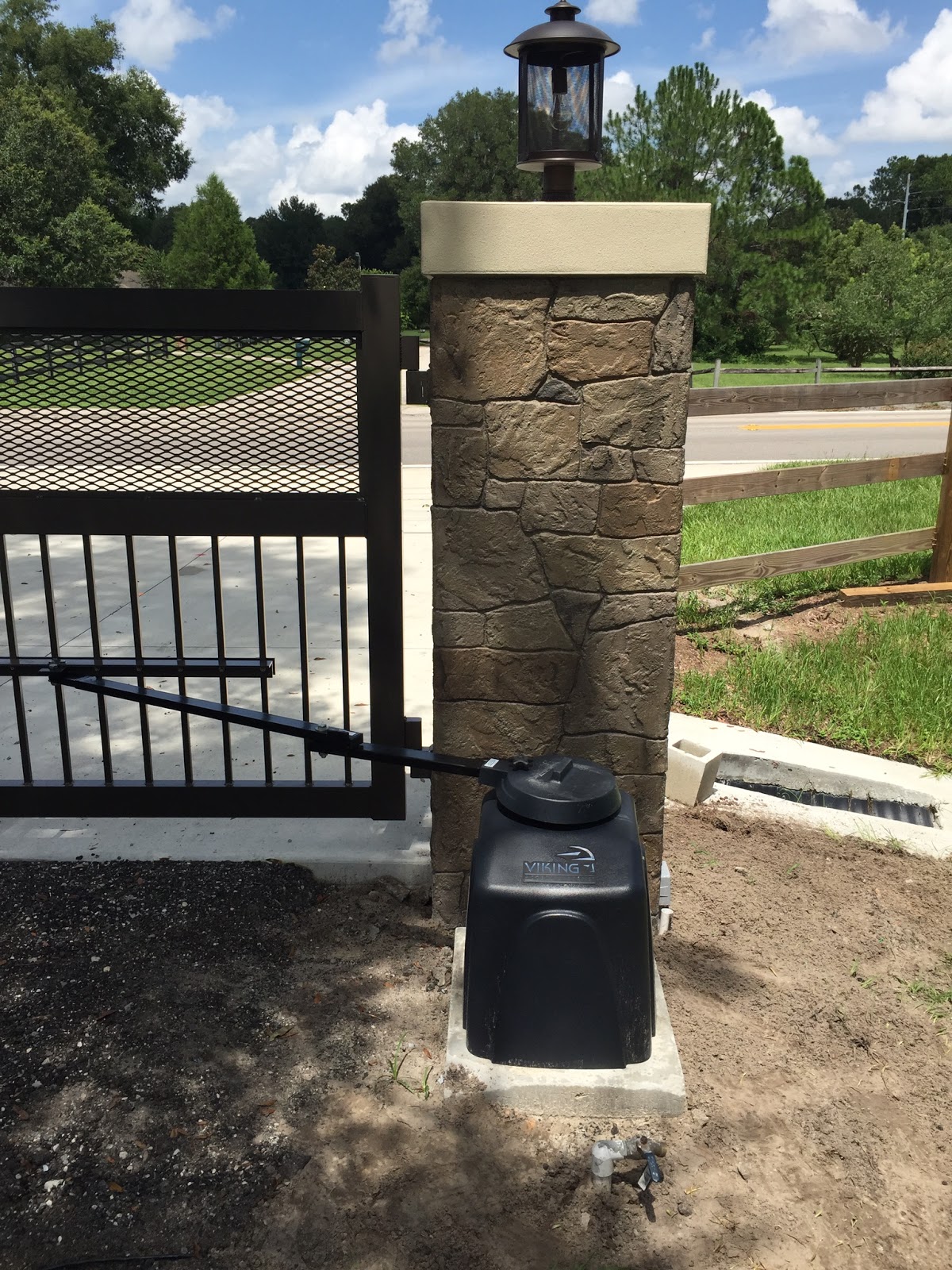 Viking gate operator installed at a driveway gate