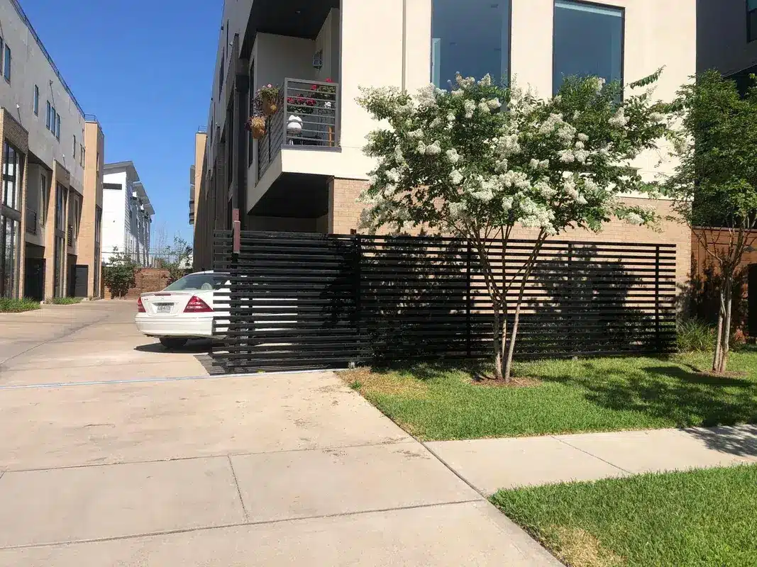 Star Gate & Fence crew installing in an HOA neighborhood