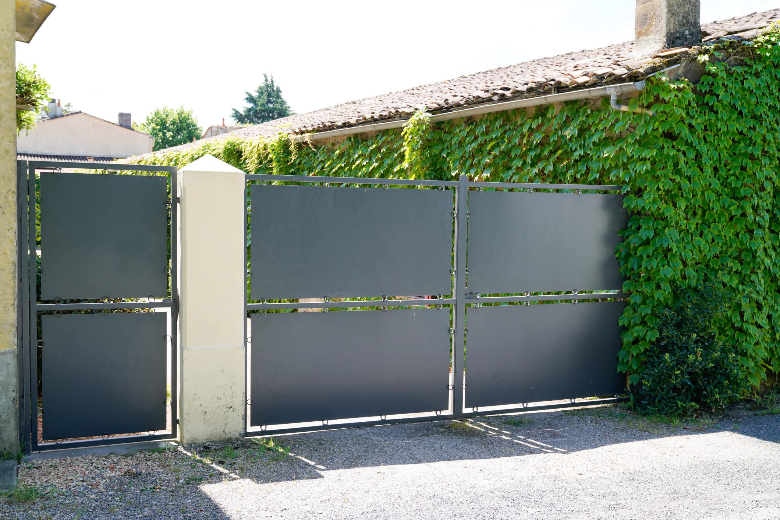 Powder-coated steel gate at a suburban DFW home